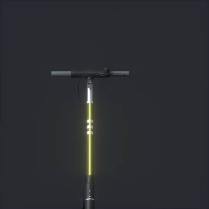 Yellow scooter handlebar with black grip on a dark background