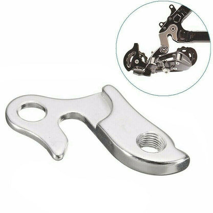 Metallic hinge component with a close-up inset on a white background
