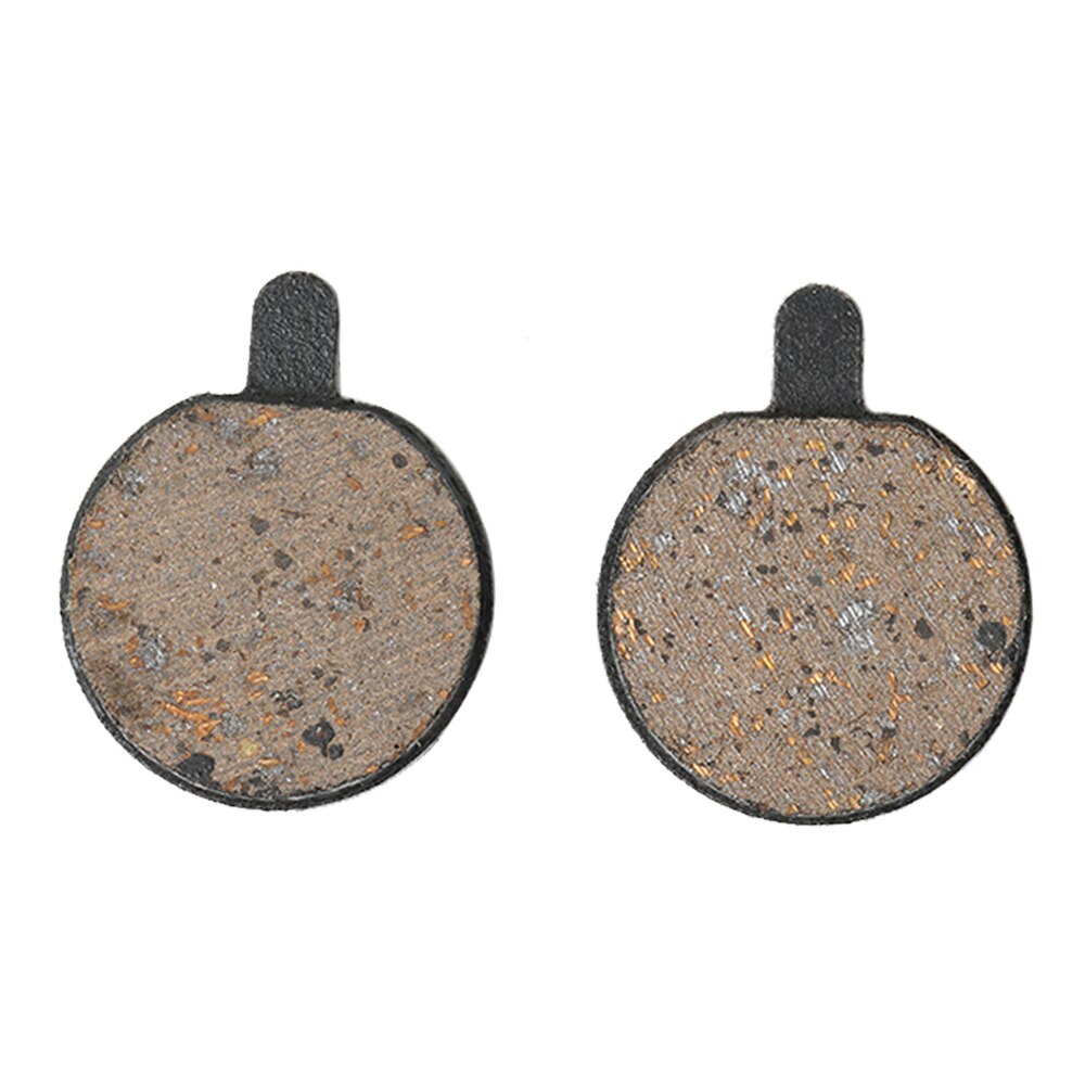 Two round brake pads on a white background