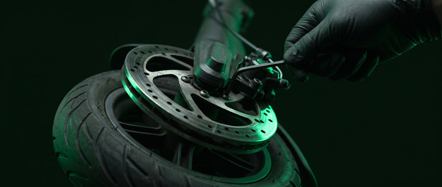 Brake caliper and disc rotor service on an electric scooter